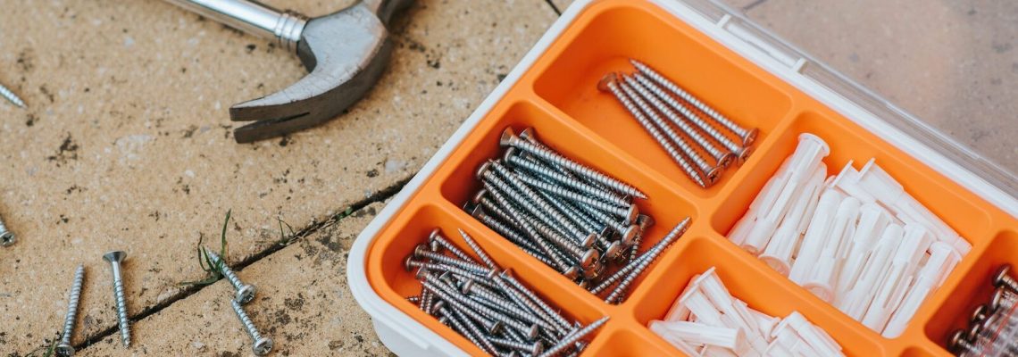 Box of screws and hammer